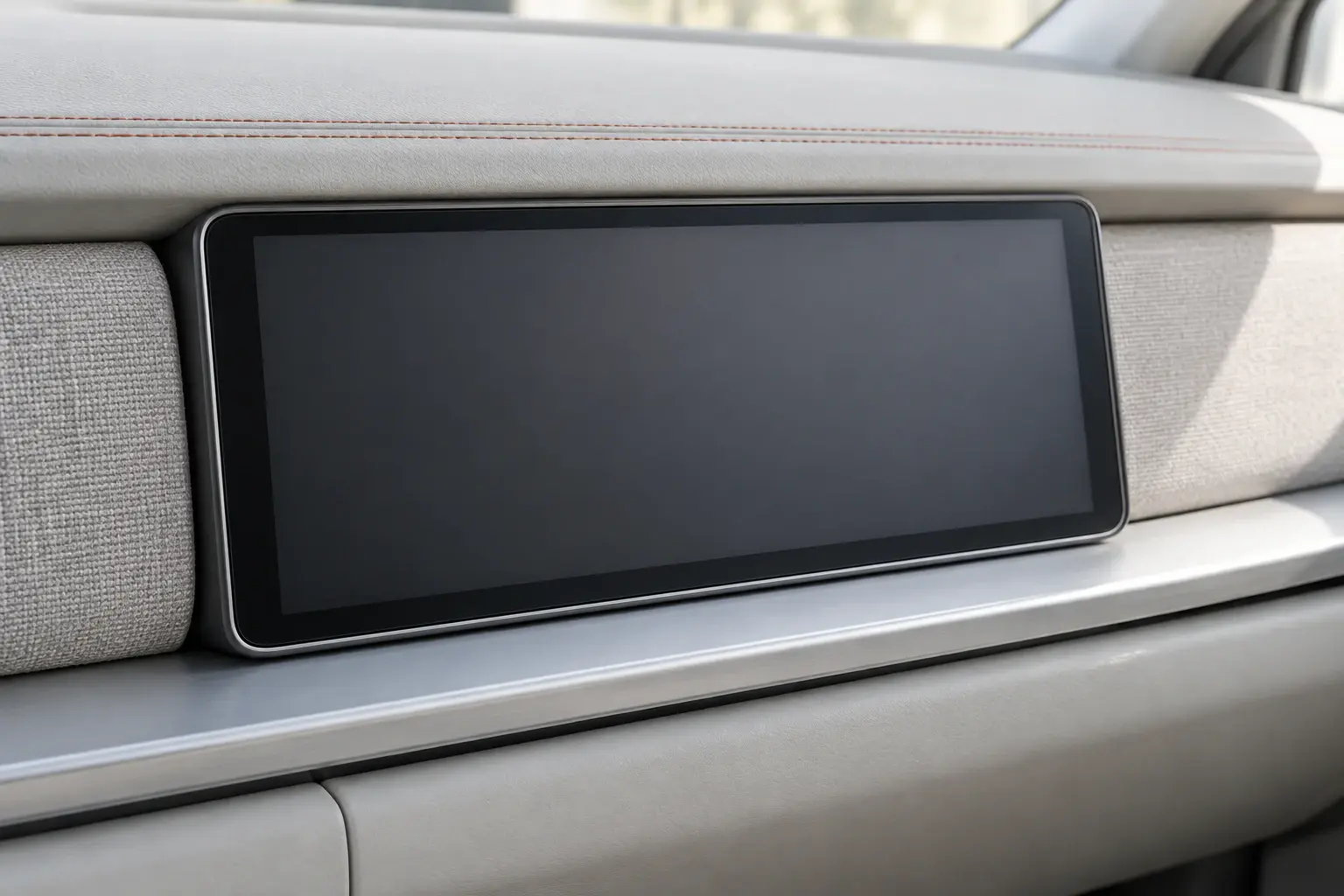 Illustration: a car's centre display with a dark, empty screen.